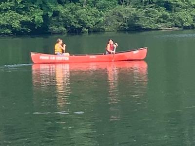 4-H summer campers canoeing.