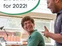 Volunteer and teen work together on the computer. "Enroll in 4-H for 2022!"