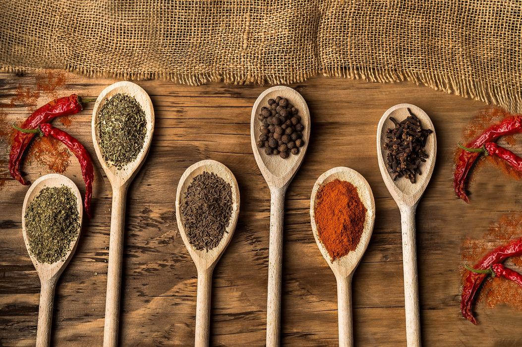 spices in wooden spoons