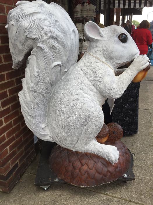 white squirrel statue