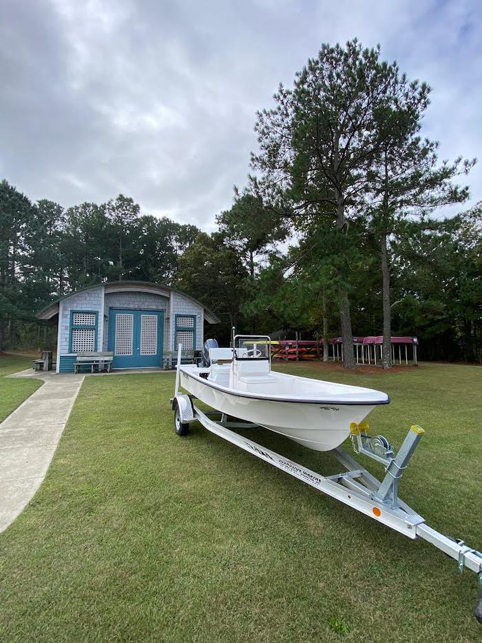 Photo of a small boat on a trailer.