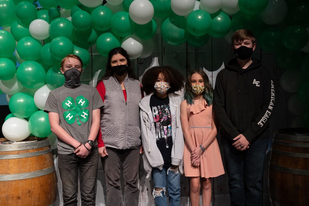 Members and leaders of the Cooking 4-H Club pose together at 4-H Achievement Night.