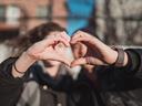 Couple Making Heart with their Hands