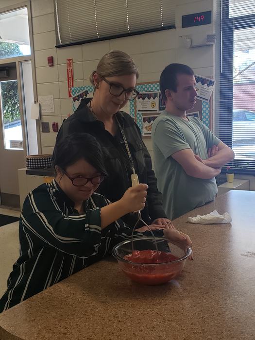 HHS Students learning proper canning techniques