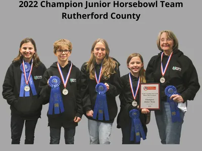2022 Champion Junior Horsebowl Team Rutherford County: five people with medals, ribbons, plaque