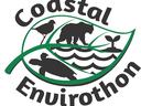 Coastal Envirothon logo showing a leaf with a bird, bear, turtle, waves, and seedling