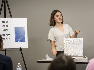 girl giving a presentation
