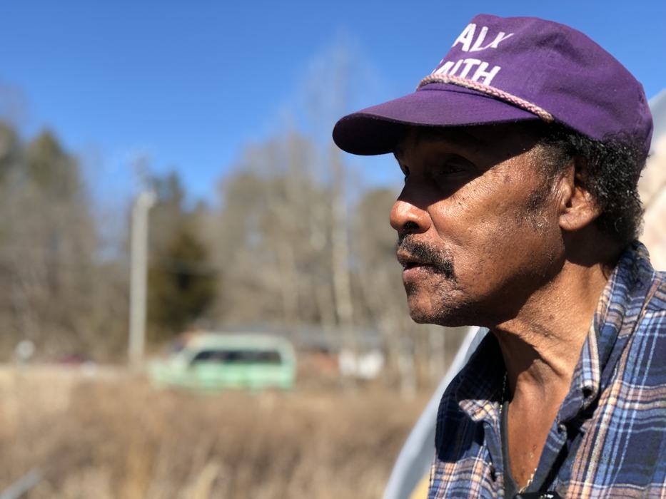 Vern Switzer wearing a purple hat