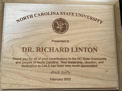 wooden plaque thanking Dean Richard Linton for his contributions to NC State