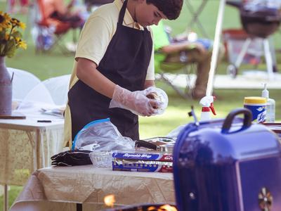 preparing food on the grill.