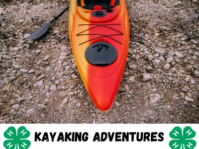 Red-yellow kayak on rocky shore with paddle; text "KAYAKING ADVENTURES" and 4‑H clovers