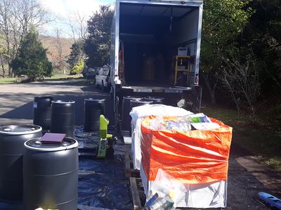 Old pesticides are packaged for disposal