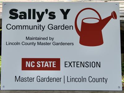 Sally's Y Community Garden sign — Maintained by Lincoln County Master Gardeners; NC STATE EXTENSION