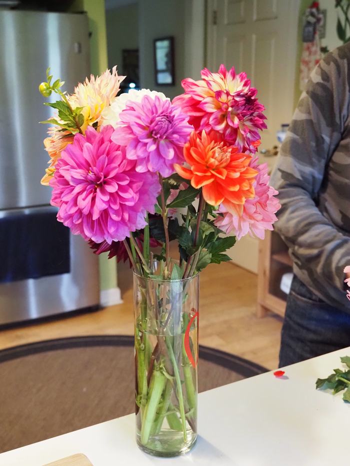 A bouquet of flowers in a glass vase.