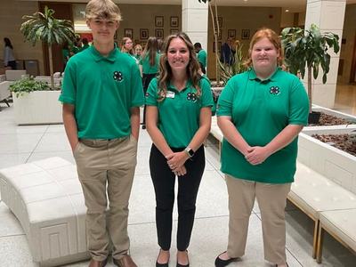 Alamance 4-H members Noah and Lexie with Agent Sarah in the NC Legislative Building