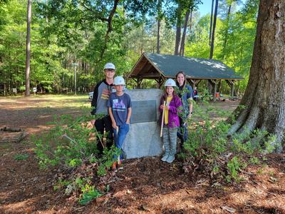 Alamance 4-H Forestry Team. Pictured left to right; Noah Snyder, Aedyn Snyder, Kenzi Riley, Sarah Maddry (Coach).