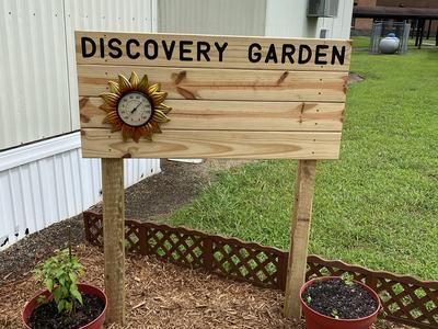 Wooden sign for a garden