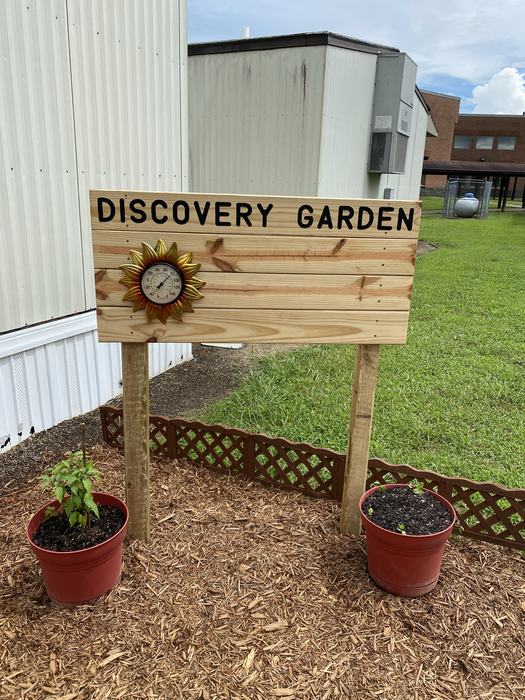 Wooden sign for a garden