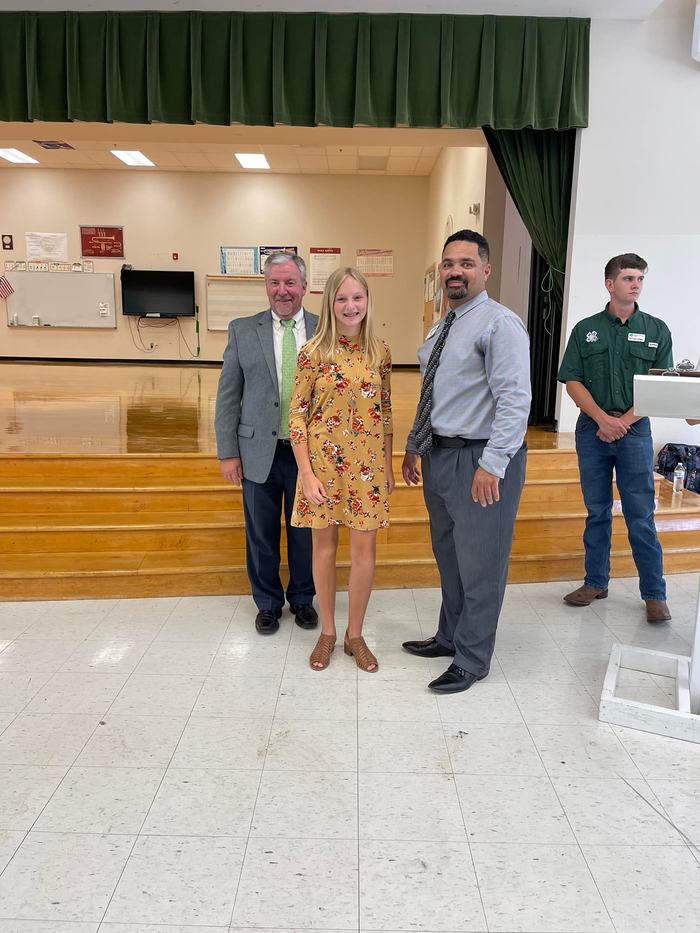 Kiya Kernodle with Dr. Mike Yoder, Director of NC 4-H, and Mr. Tyrone Fisher, Interim North Central District Extension Director.