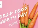 Bunch of carrots on pink background with text "WORLD FOOD SAFETY DAY" and "JUNE 7"