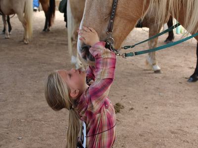Brooklyn Arney bonds with horse Fabio at the West District 4-H Horse Show on April 30, 2022. The pair participated in Cloverbud classes at the show.