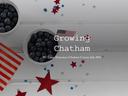 Two bowls of blueberries, US flag and red stars on white board with text "Growing Chatham"