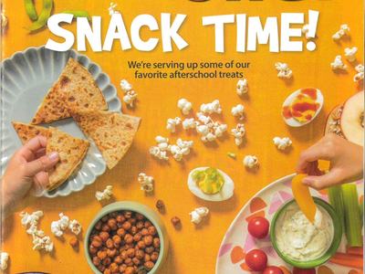 Magazine cover reading "CHOP CHOP SNACK TIME!" showing hands and assorted snacks