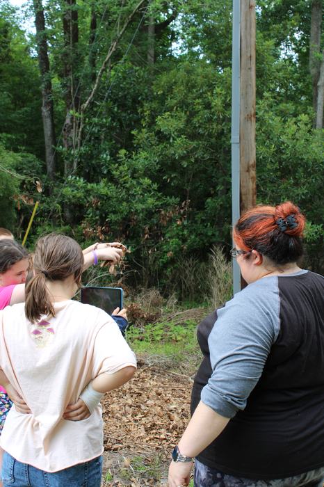 Children using ipads to take a roll