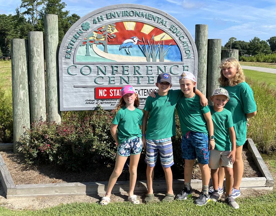 Campers at Eastern Center sign