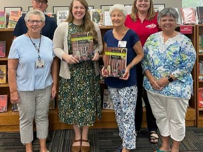 Extension Master Gardener Volunteers donate hardcopies of NC Extension Gardener Handbooks to Wayne County Public Library.
