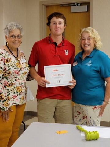 Colby Brown (middle) is awarded the 2022 Master Gardener Scholarship. Also pictured are Master Gardener Volunteers Veronica Martin (left) and Linda Kruegel (right).