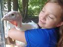 girl holding turkey