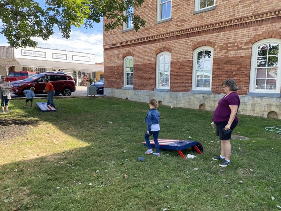 people playing corn hole