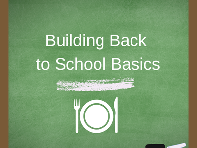 Chalkboard reading "Building Back to School Basics" with plate, fork, knife and chalk