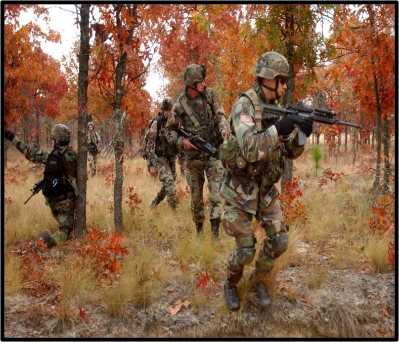  Fort Bragg ground troops on a training mission in a NC Forest