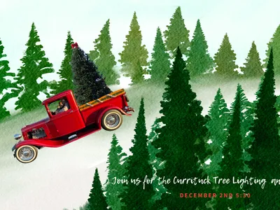 red truck delivers tree for Christmas tree lighting and parade on December 2nd