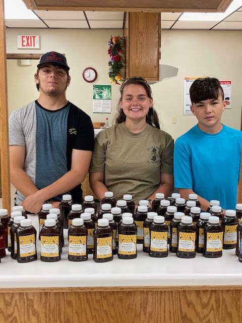 4-H Kids selling Honey