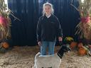4-H'er with prize winning goat