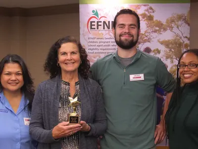 Staff members receiving award