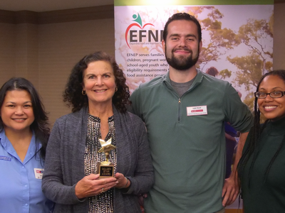 Staff members receiving award