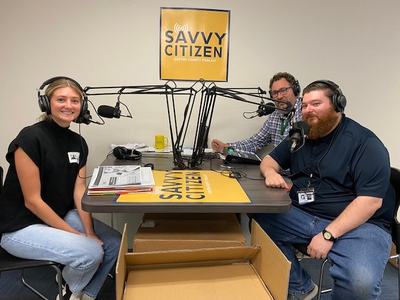 staff conducting monthly podcast