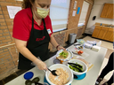 Educator preparing food