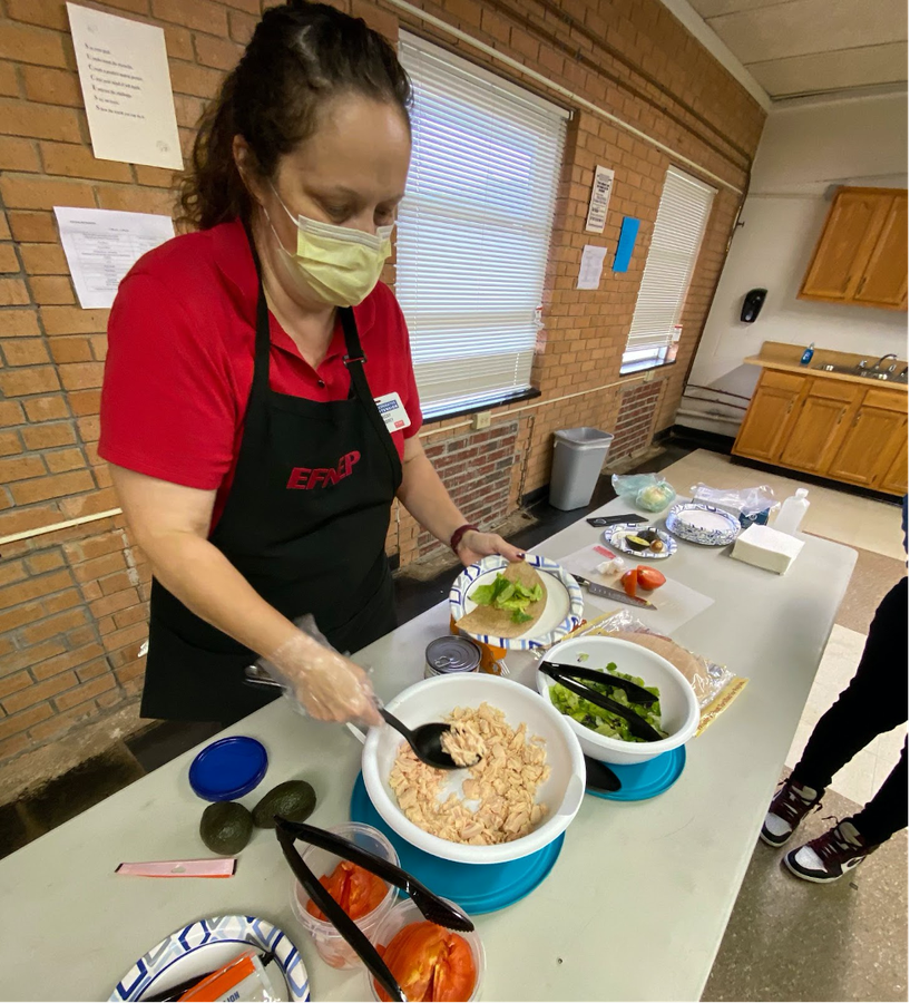 Educator preparing food 