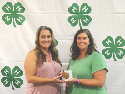 Nicki Carpenter receiving award