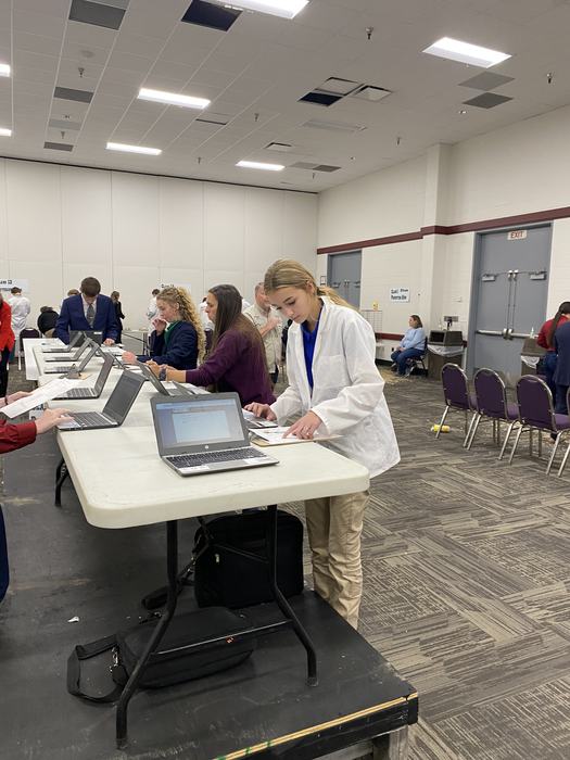 4-h youth competing in poultry judging