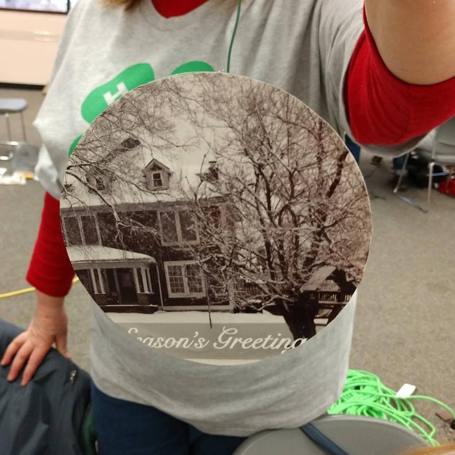 A craft from the 2018 Holiday Crafts event repurposed old CDs into a new Christmas ornament.