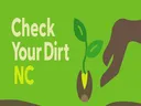 Hand planting seedling over soil; text 'Check Your Dirt NC'