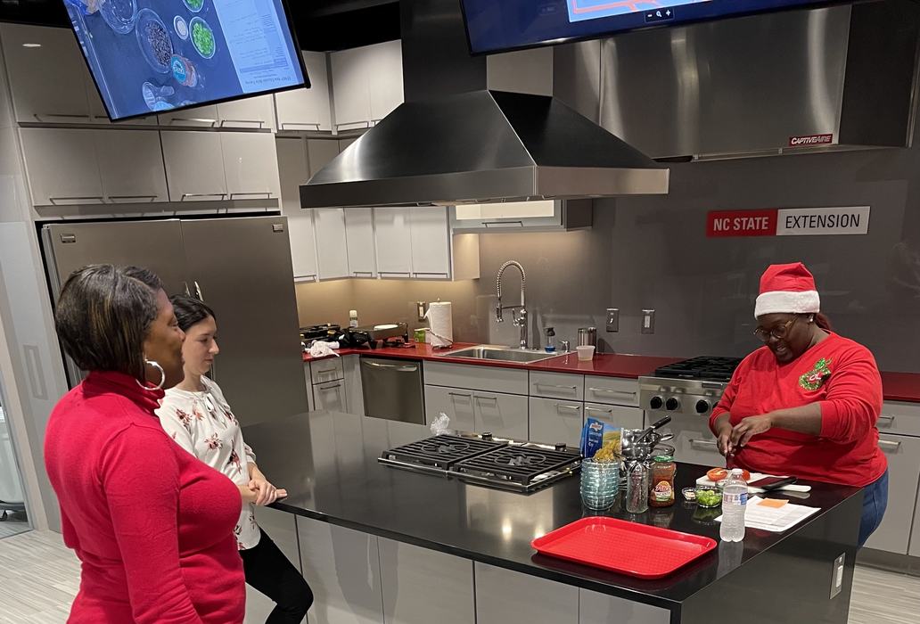 Educator leading food demonstration 