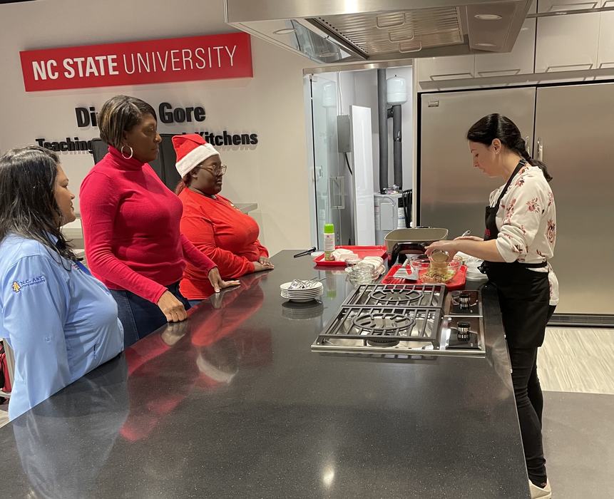 educator demonstrating food skills