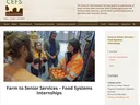 Woman in hi‑vis jacket holding a crate of oranges in a warehouse; text: "Farm to Senior Services"